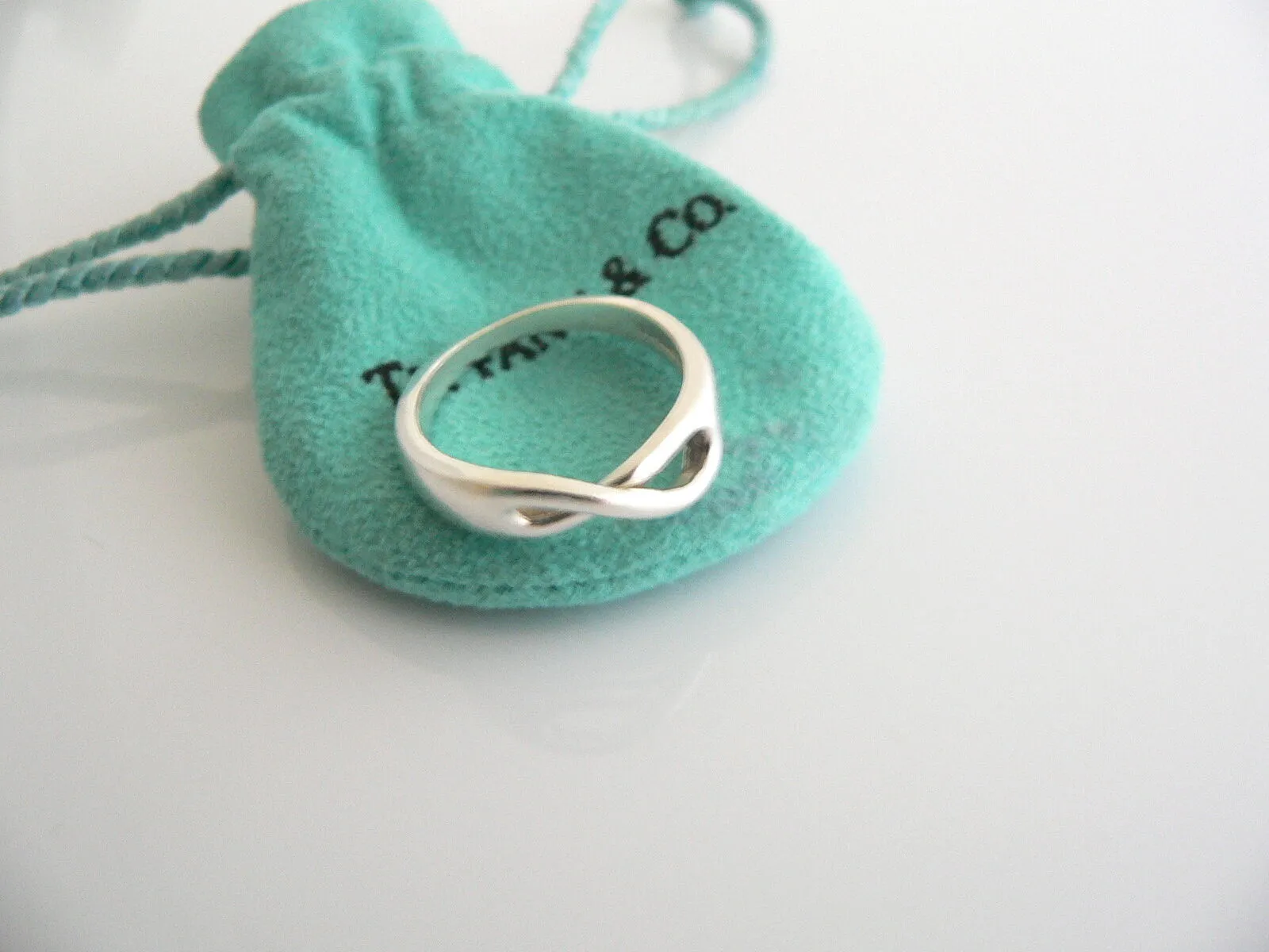 Tiffany & Co Silver Infinity Love Knot Ring Band Sz 5.5 Gift Pouch